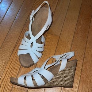 AEROSOLES wedges with white straps.